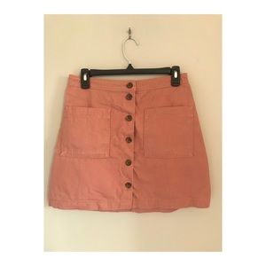 Pink denim mini skirt